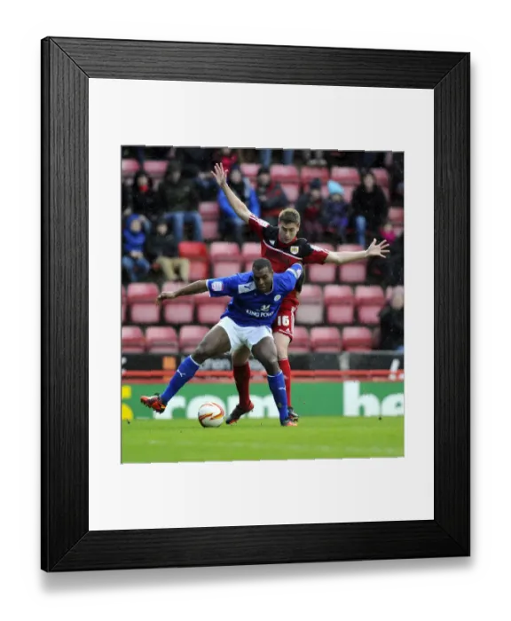 Framed Print : Battling for Supremacy: Davies vs. Morgan in Bristol City vs. Leicester City Championship Clash, January 2013
