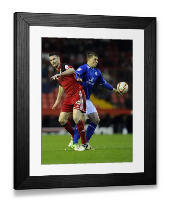 Framed Print : Battling for Supremacy: McManus vs. Wood in the Championship Clash between Bristol City and Leicester City