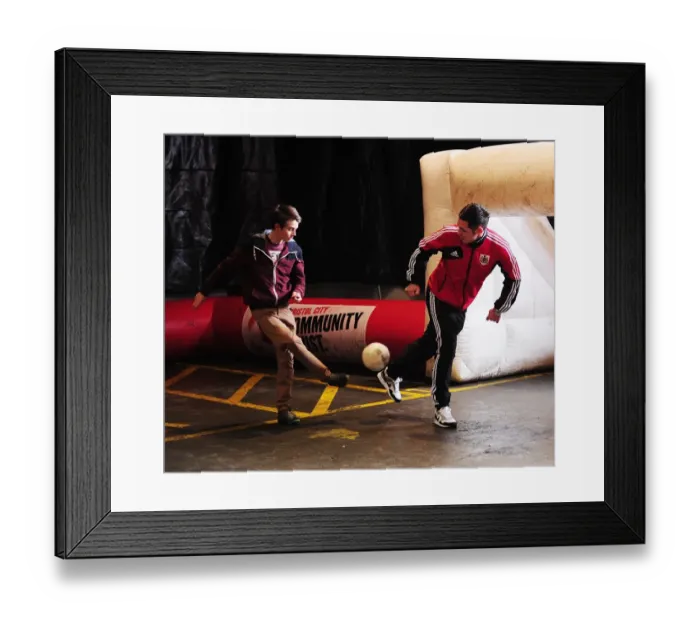 Framed Print : Bristol City's Lewis Carey Engages in Pre-Match Football Fun with Young Fans at Community Park Framed Print : Bristol City's Lewis Carey Engages in Pre-Match Football Fun with Young Fans at Community Park