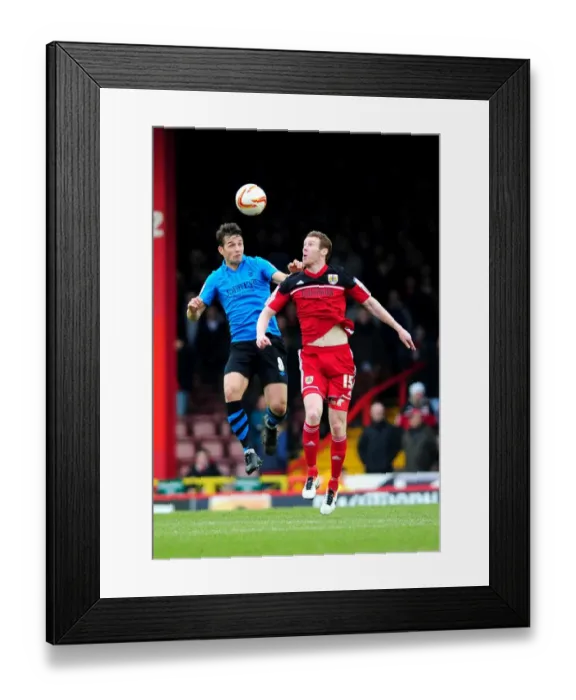 Framed Print : Intense Header Battle: Pearson vs. Cohen - Npower Championship Showdown Framed Print : Intense Header Battle: Pearson vs. Cohen - Npower Championship Showdown