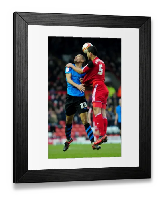 Framed Print : Bristol City's Lewin Nyatanga Secures Victory with Powerful Heading Against Nottingham Forest's Dexter Blackstock Framed Print : Bristol City's Lewin Nyatanga Secures Victory with Powerful Heading Against Nottingham Forest's Dexter Blackstock