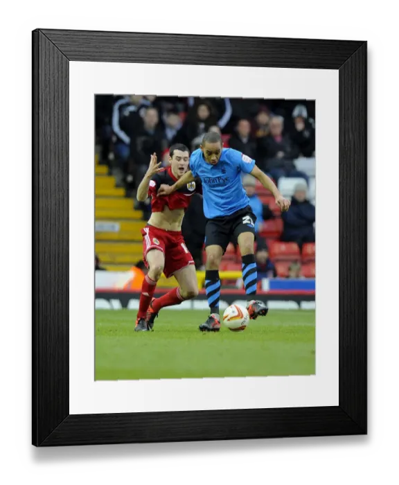 Framed Print : Battling for Supremacy: Moloney vs. Blackstock in the Npower Championship Clash between Bristol City and Nottingham Forest Framed Print : Battling for Supremacy: Moloney vs. Blackstock in the Npower Championship Clash between Bristol City and Nottingham Forest