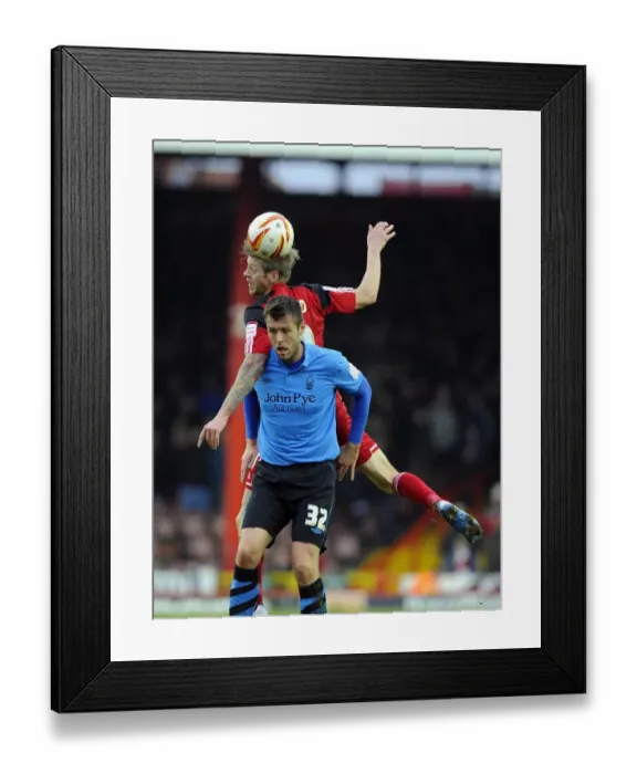 Framed Print : Battling for Supremacy: Jon Stead vs Elliott Ward in the Npower Championship Clash between Bristol City and Nottingham Forest Framed Print : Battling for Supremacy: Jon Stead vs Elliott Ward in the Npower Championship Clash between Bristol City and Nottingham Forest