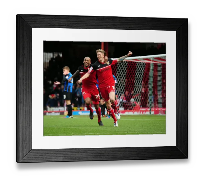 Framed Print : Bristol City: Stead and Elliott's Euphoric Moment as They Celebrate Goal Against Barnsley in Npower Championship (2013) Framed Print : Bristol City: Stead and Elliott's Euphoric Moment as They Celebrate Goal Against Barnsley in Npower Championship (2013)