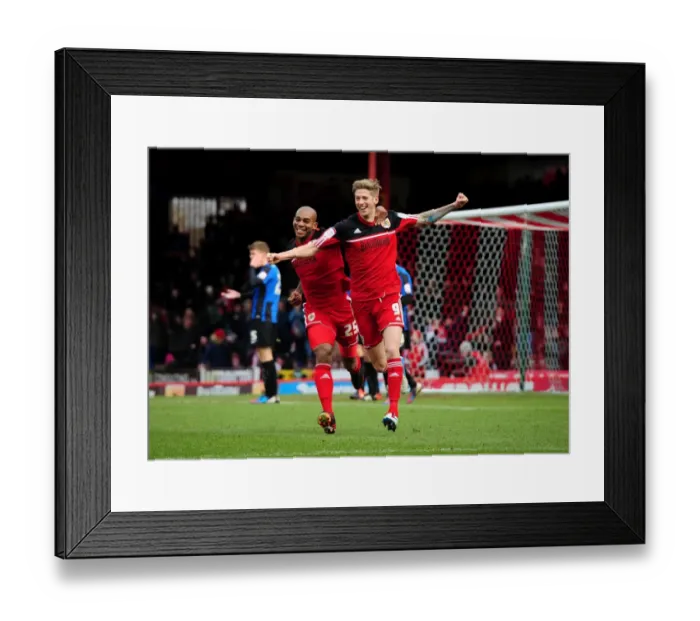 Framed Print : Thrilling Goal Celebration: Stead and Elliott's Unforgettable Moment at Ashton Gate (Bristol City vs. Barnsley, Npower Championship, 2013) Framed Print : Thrilling Goal Celebration: Stead and Elliott's Unforgettable Moment at Ashton Gate (Bristol City vs. Barnsley, Npower Championship, 2013)