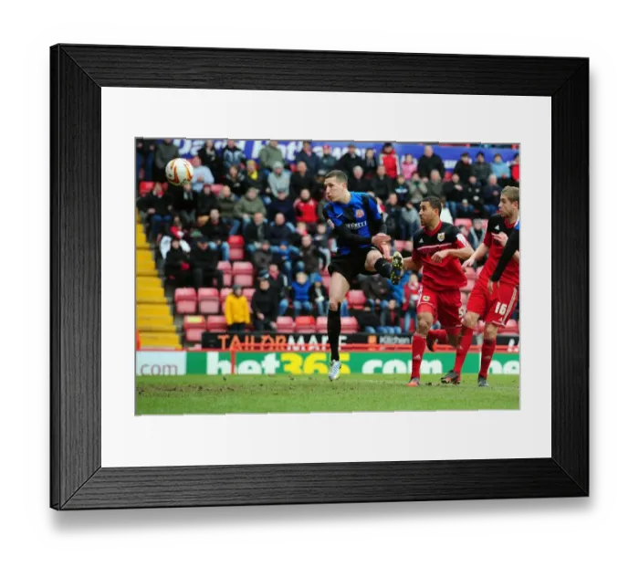 Framed Print : Bristol City's Lewin Nyatanga Scores Fourth Goal in Npower Championship Match Against Barnsley Framed Print : Bristol City's Lewin Nyatanga Scores Fourth Goal in Npower Championship Match Against Barnsley