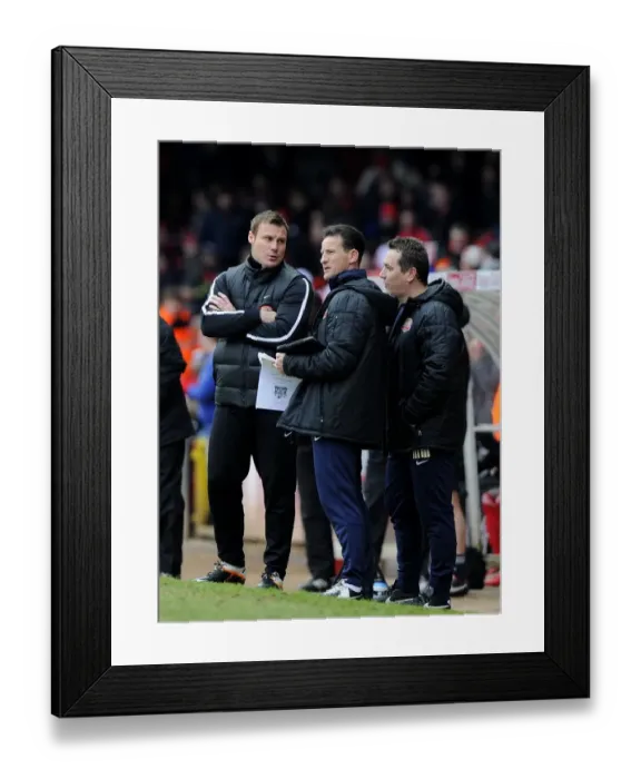Framed Print : Bristol City vs Barnsley: David Flitcroft's Intense Discussion with Backroom Staff during Npower Championship Match (February 2013) Framed Print : Bristol City vs Barnsley: David Flitcroft's Intense Discussion with Backroom Staff during Npower Championship Match (February 2013)