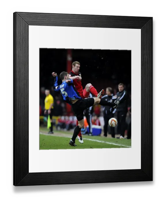 Framed Print : Battling for Supremacy: Pearson vs. Delap in Npower Championship Clash between Bristol City and Barnsley