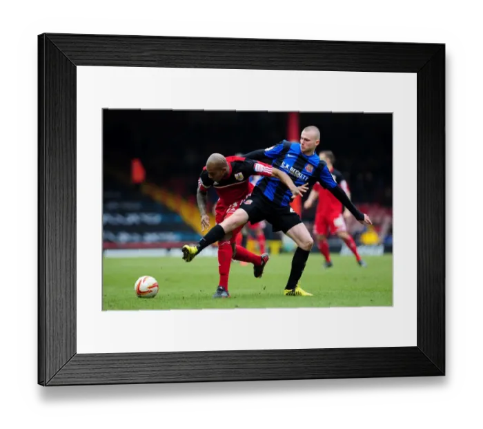 Framed Print : Intense Football Rivalry: Marvin Elliott vs. Ryan Tunnicliffe at Ashton Gate Framed Print : Intense Football Rivalry: Marvin Elliott vs. Ryan Tunnicliffe at Ashton Gate