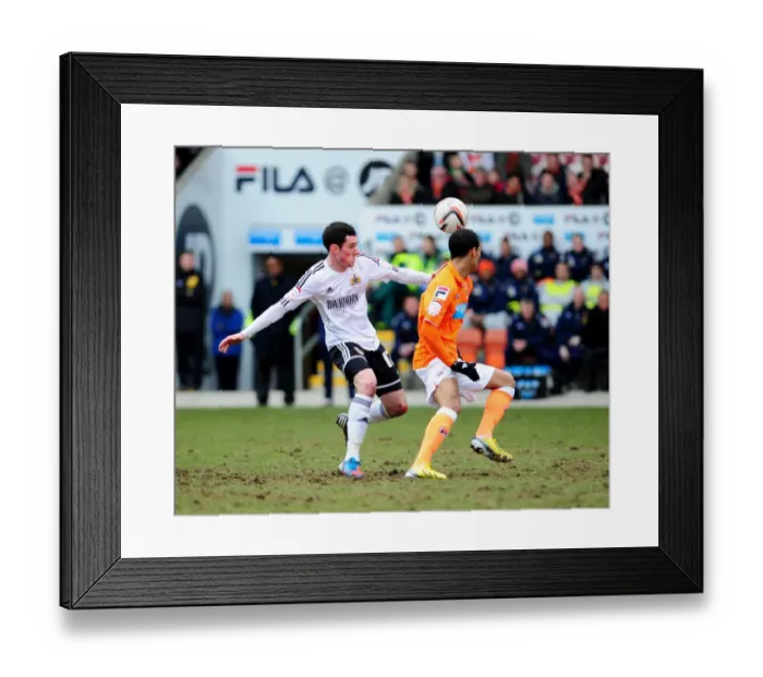 Framed Print : Blackpool's Thomas Ince Evades Bristol City's Gregg Cunningham During Npower Championship Clash