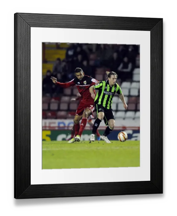 Framed Print : Intense Rivalry: Fontaine vs Mackail-Smith - Football Clash between Bristol City and Brighton & Hove Albion