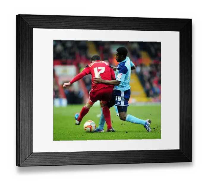 Framed Print : Intense Rivalry: Carayol vs. Cunningham - Bristol City vs. Middlesbrough Football Battle