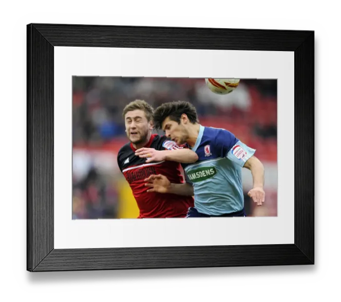 Framed Print : Bristol City vs Middlesbrough: Steven Davies vs George Friend Battle for High Ball Framed Print : Bristol City vs Middlesbrough: Steven Davies vs George Friend Battle for High Ball