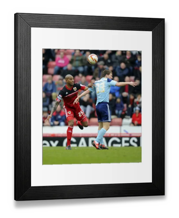 Framed Print : Bristol City vs Middlesbrough: Marvin Elliott vs Richard Smallwood - Intense Battle for the High Ball Framed Print : Bristol City vs Middlesbrough: Marvin Elliott vs Richard Smallwood - Intense Battle for the High Ball