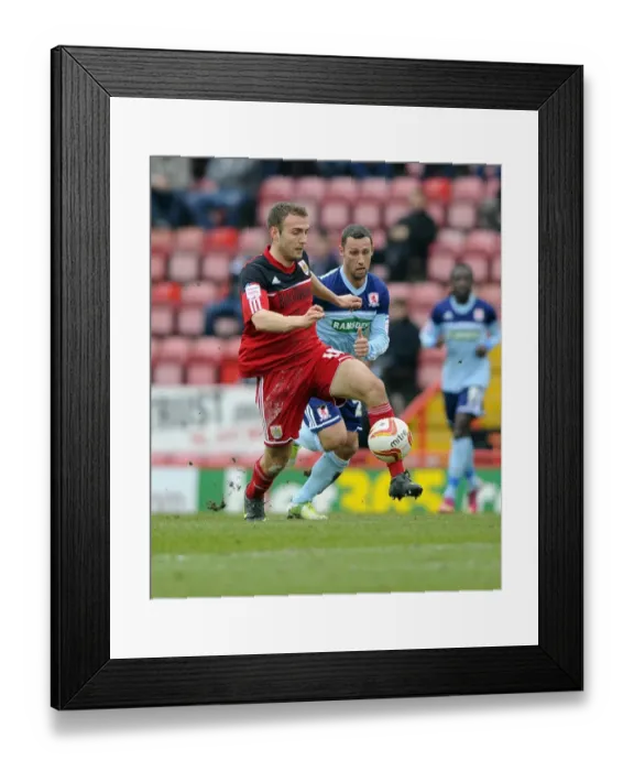 Framed Print : Battling for Supremacy: Liam Kelly vs. Scott McDonald in the Npower Championship Clash between Bristol City and Middlesbrough Framed Print : Battling for Supremacy: Liam Kelly vs. Scott McDonald in the Npower Championship Clash between Bristol City and Middlesbrough