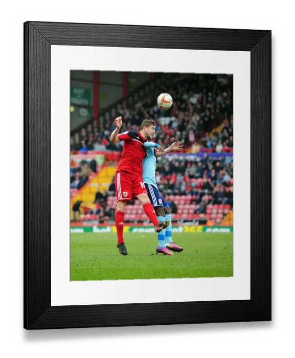 Framed Print : Intense Aerial Battle: Davies vs Emnes - Championship Football Rivalry