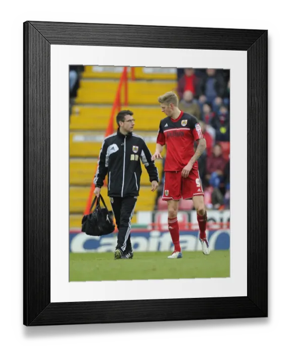 Framed Print : Bristol City's Jon Stead Exits the Field Injured During Bristol City V Middlesbrough Match, 09-03-2013