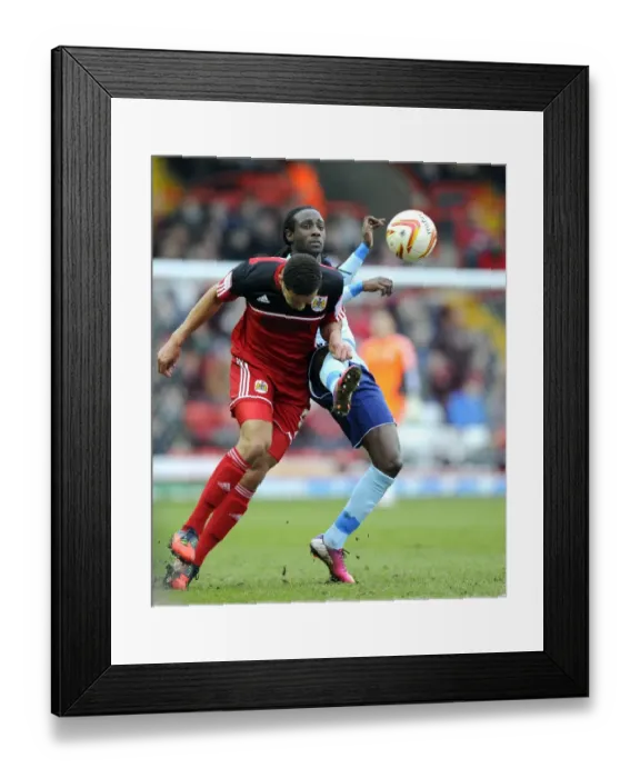 Framed Print : Bristol City vs Middlesbrough: Lewin Nyatanga vs Marvin Emnes - A Battle for Supremacy in the Npower Championship Framed Print : Bristol City vs Middlesbrough: Lewin Nyatanga vs Marvin Emnes - A Battle for Supremacy in the Npower Championship