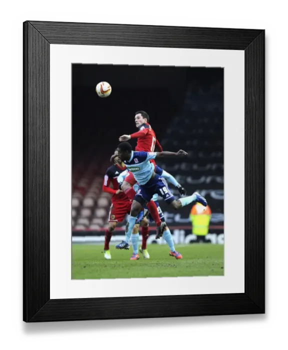 Framed Print : Bristol City vs Middlesbrough: Intense Aerial Battle Between Greg Cunningham and Mustapha Carayol Framed Print : Bristol City vs Middlesbrough: Intense Aerial Battle Between Greg Cunningham and Mustapha Carayol