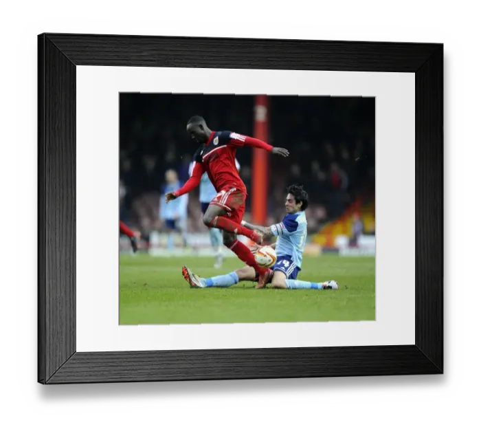 Framed Print : Bristol City vs Middlesbrough: Intense Moment as Rhys Williams Tackles Albert Adomah Framed Print : Bristol City vs Middlesbrough: Intense Moment as Rhys Williams Tackles Albert Adomah