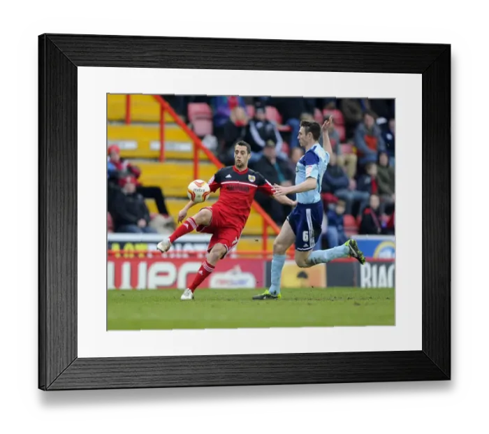 Framed Print : Bristol City's Sam Baldock Attempts A Flick Over Middlesbrough's Stephen McManus During Npower Championship Match