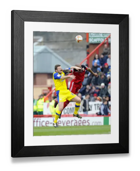 Framed Print : Battling for Supremacy: Marvin Elliott vs. Steve Howard in the Npower Championship Clash between Bristol City and Sheffield Wednesday