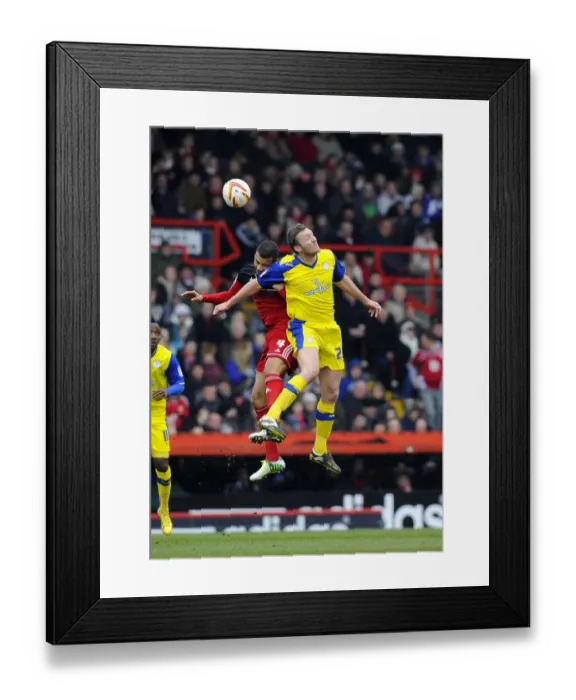 Framed Print : Battling for Supremacy: Liam Fontaine vs. Steve Howard in the Npower Championship Clash between Bristol City and Sheffield Wednesday Framed Print : Battling for Supremacy: Liam Fontaine vs. Steve Howard in the Npower Championship Clash between Bristol City and Sheffield Wednesday
