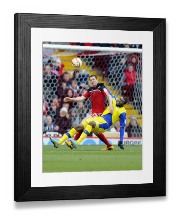 Framed Print : Battling for Supremacy: Moloney vs. Helan in the Npower Championship Clash between Bristol City and Sheffield Wednesday
