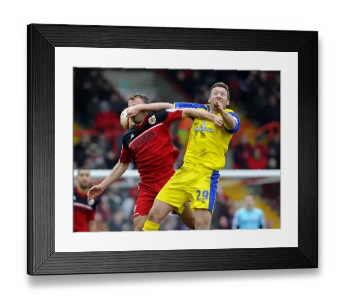 Framed Print : Intense Aerial Battle: Liam Kelly vs. Steve Howard - Football Rivalry in the Sky Framed Print : Intense Aerial Battle: Liam Kelly vs. Steve Howard - Football Rivalry in the Sky
