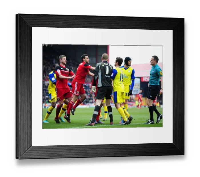 Framed Print : Controversial Penalty and Heated Confrontation: Greg Cunningham's Diving Incident Sparks Tension between Bristol City and Sheffield Wednesday Players Framed Print : Controversial Penalty and Heated Confrontation: Greg Cunningham's Diving Incident Sparks Tension between Bristol City and Sheffield Wednesday Players