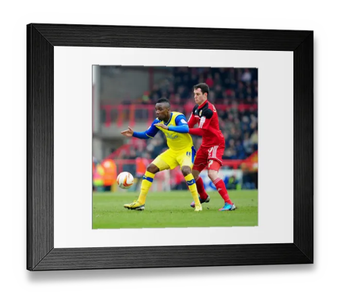 Framed Print : Intense Rivalry: Jermaine Johnson vs. Gregg Cunningham - Bristol City vs. Sheffield Wednesday Football Showdown