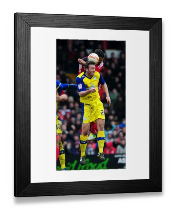 Framed Print : Bristol City's Liam Fontaine vs. Sheffield Wednesday's Steve Howard: A Heading Duel in the Npower Championship, April 2013