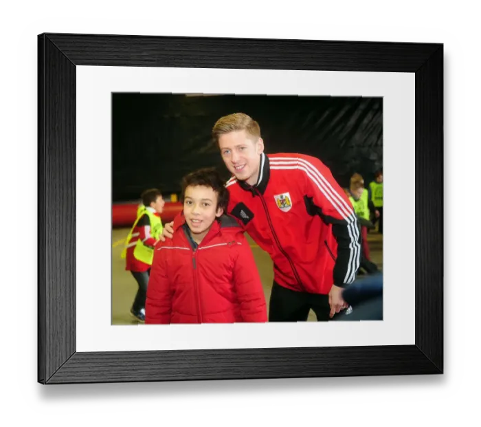 Framed Print : Bristol City's Jon Stead Engages with a Fan in the Community: Bristol City vs. Sheffield Wednesday, April 1, 2013