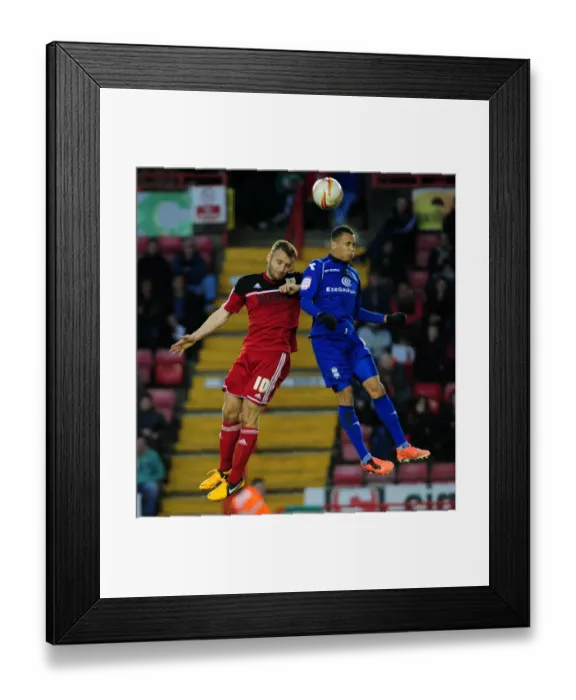 Framed Print : Intense Rivalry: Liam Kelly and Ravel Morrison Clash in Bristol City vs Birmingham City Framed Print : Intense Rivalry: Liam Kelly and Ravel Morrison Clash in Bristol City vs Birmingham City