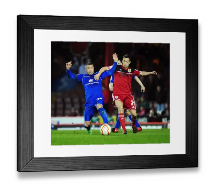 Framed Print : Intense Rivalry: Sam Baldock vs. Paul Robinson Clash in Bristol City vs. Birmingham City Football Match
