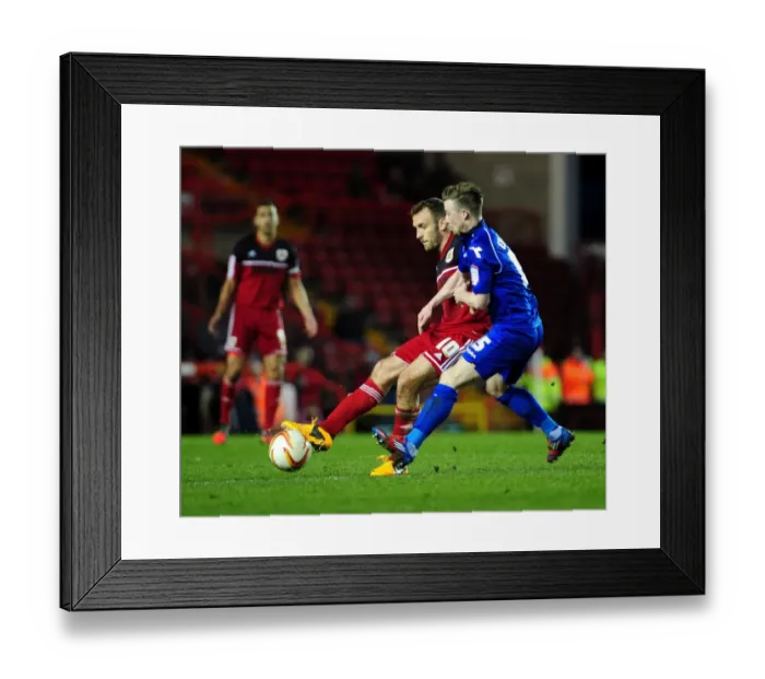 Framed Print : Intense Rivalry: Wade Elliott Chases Down Liam Kelly in Bristol City vs Birmingham City Football Match