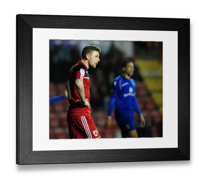 Framed Print : Bristol City's Paul Anderson in Despair as Team Gets Relegated (160413)