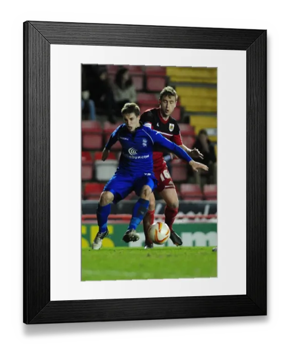 Framed Print : Battling Forwards in the Npower Championship: Hancox vs. Davies at Ashton Gate Framed Print : Battling Forwards in the Npower Championship: Hancox vs. Davies at Ashton Gate