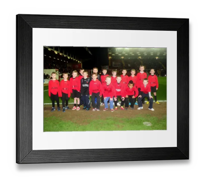 Framed Print : Bristol City Flag Bearers Clash: Npower Championship Showdown between Bristol City and Birmingham City