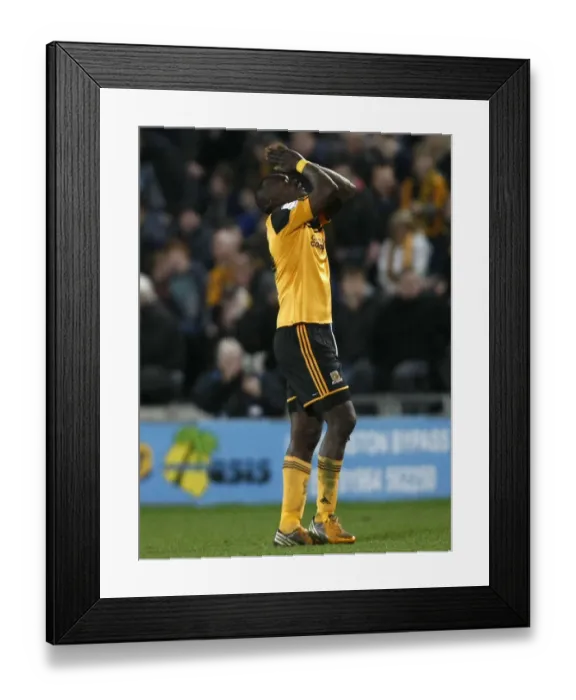 Framed Print : Abdoulaye Faye Contemplates Championship Draw: Hull City vs. Bristol City, 2013