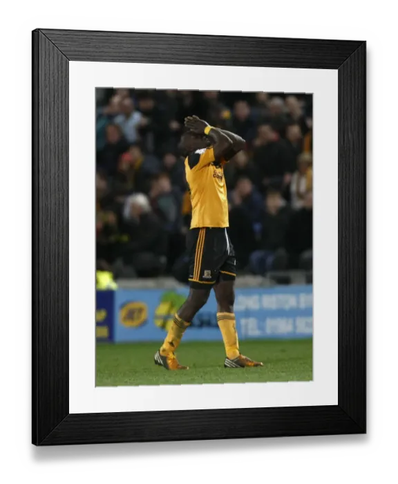 Framed Print : Abdoulaye Faye of Hull City Ponders the Implications of a Draw: Hull City vs. Bristol City, 2013 Framed Print : Abdoulaye Faye of Hull City Ponders the Implications of a Draw: Hull City vs. Bristol City, 2013