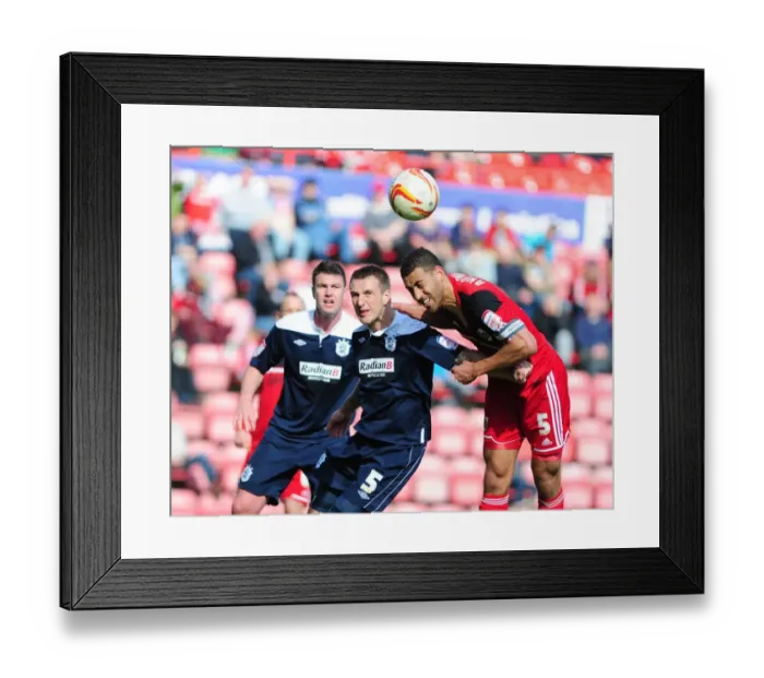 Framed Print : Bristol City's Lewin Nyatanga Scores the Decisive Header against Huddersfield Town (27-04-2013)