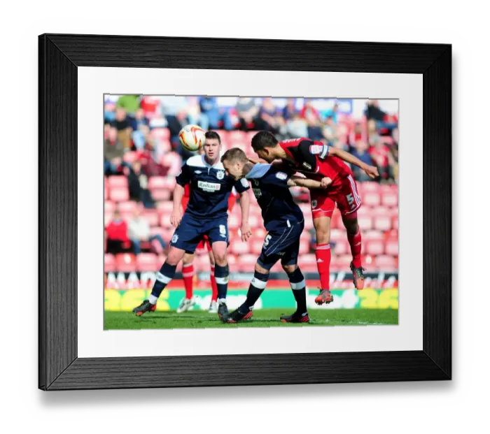 Framed Print : Bristol City's Lewin Nyatanga Scores the Dramatic Winning Header vs. Huddersfield Town (April 27, 2013) Framed Print : Bristol City's Lewin Nyatanga Scores the Dramatic Winning Header vs. Huddersfield Town (April 27, 2013)