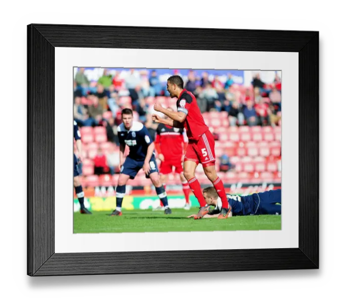 Framed Print : Bristol City's Lewin Nyatanga Scores the Winning Goal Against Huddersfield Town, Npower Championship 2013 Framed Print : Bristol City's Lewin Nyatanga Scores the Winning Goal Against Huddersfield Town, Npower Championship 2013