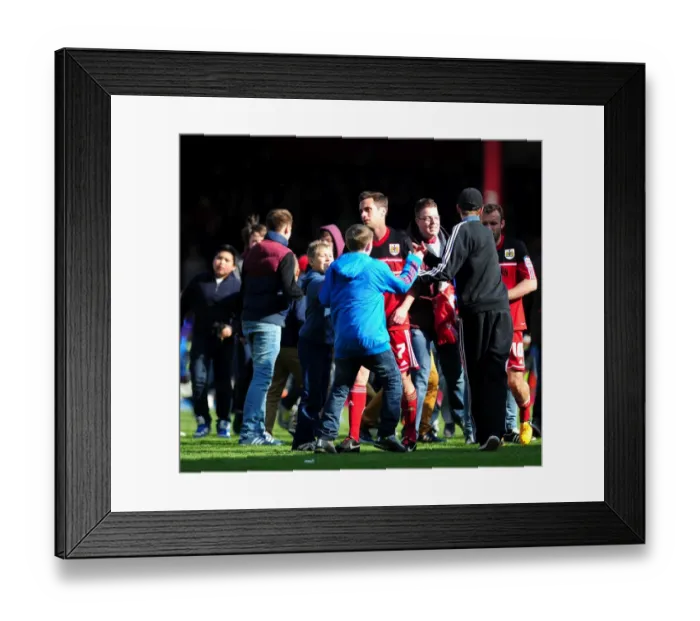 Framed Print : Bristol City Fans Invade Pitch in Euphoria of Championship Promotion Framed Print : Bristol City Fans Invade Pitch in Euphoria of Championship Promotion