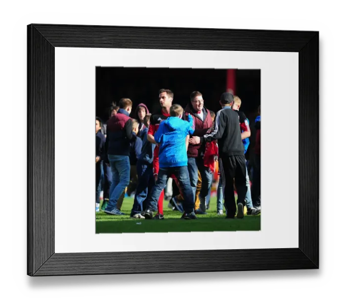 Framed Print : Bristol City Fans Celebrate Promotion to Championship with Euphoric Pitch Invasion
