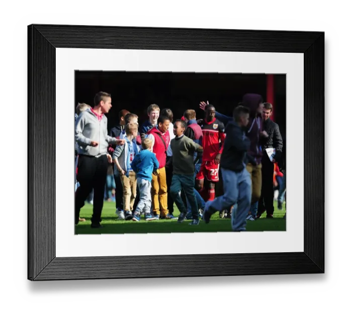 Framed Print : Bristol City Fans Euphoric Pitch Invasion: Celebrating Promotion to Championship Framed Print : Bristol City Fans Euphoric Pitch Invasion: Celebrating Promotion to Championship