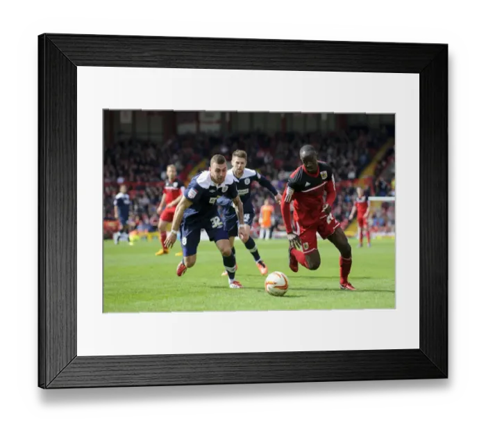 Framed Print : Bristol City vs. Huddersfield: Albert Adomah vs. Jack Hunt Battle in Championship Match Framed Print : Bristol City vs. Huddersfield: Albert Adomah vs. Jack Hunt Battle in Championship Match