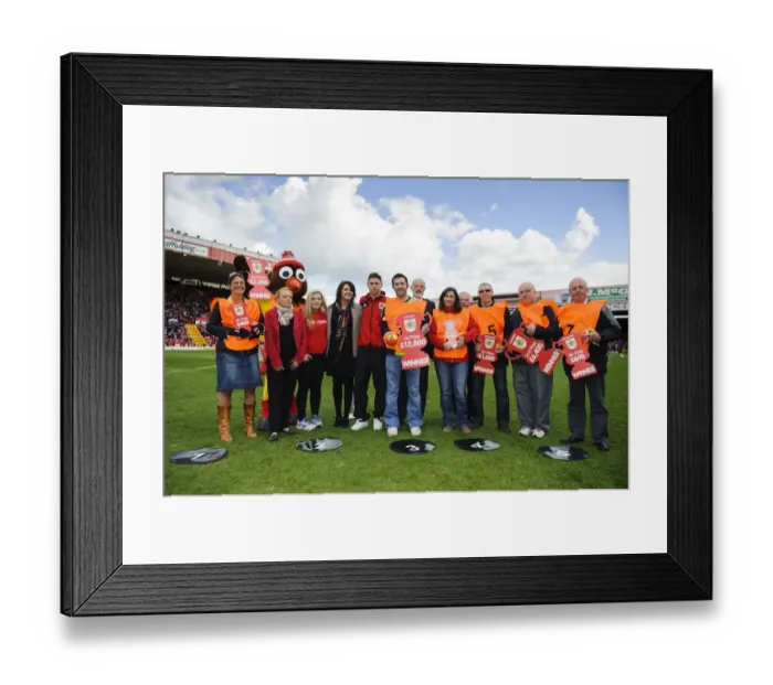 Framed Print : Exciting Half Time Moment: Winner of Bristol City FC Community Foundation Prize Draw Announced at Ashton Gate