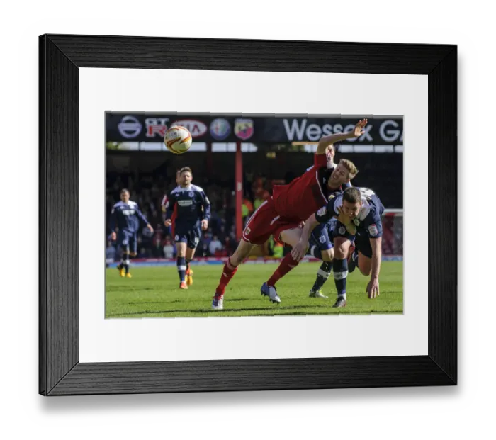 Framed Print : Bristol City vs. Huddersfield: Clash Between Stead and Gerrard in Championship Match